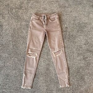 American Eagle tan distressed skinny jeans